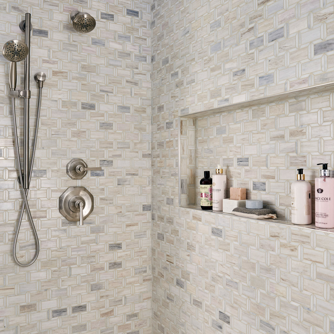 Bathroom shower area with tiled walls
